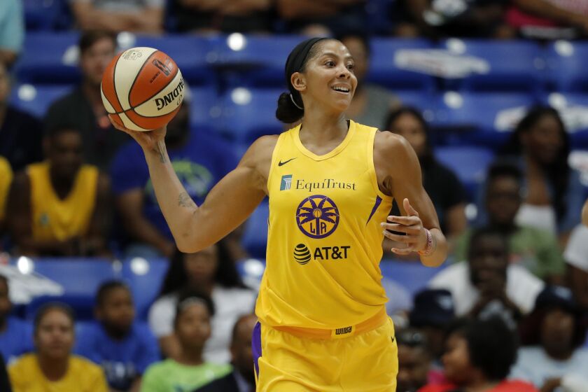 Los Angeles Sparks' Candace Parker makes a pass during a WNBA basketball game against the Dallas Wings in Arlington, Texas, Wednesday, Aug. 14, 2019. (AP Photo/Tony Gutierrez)