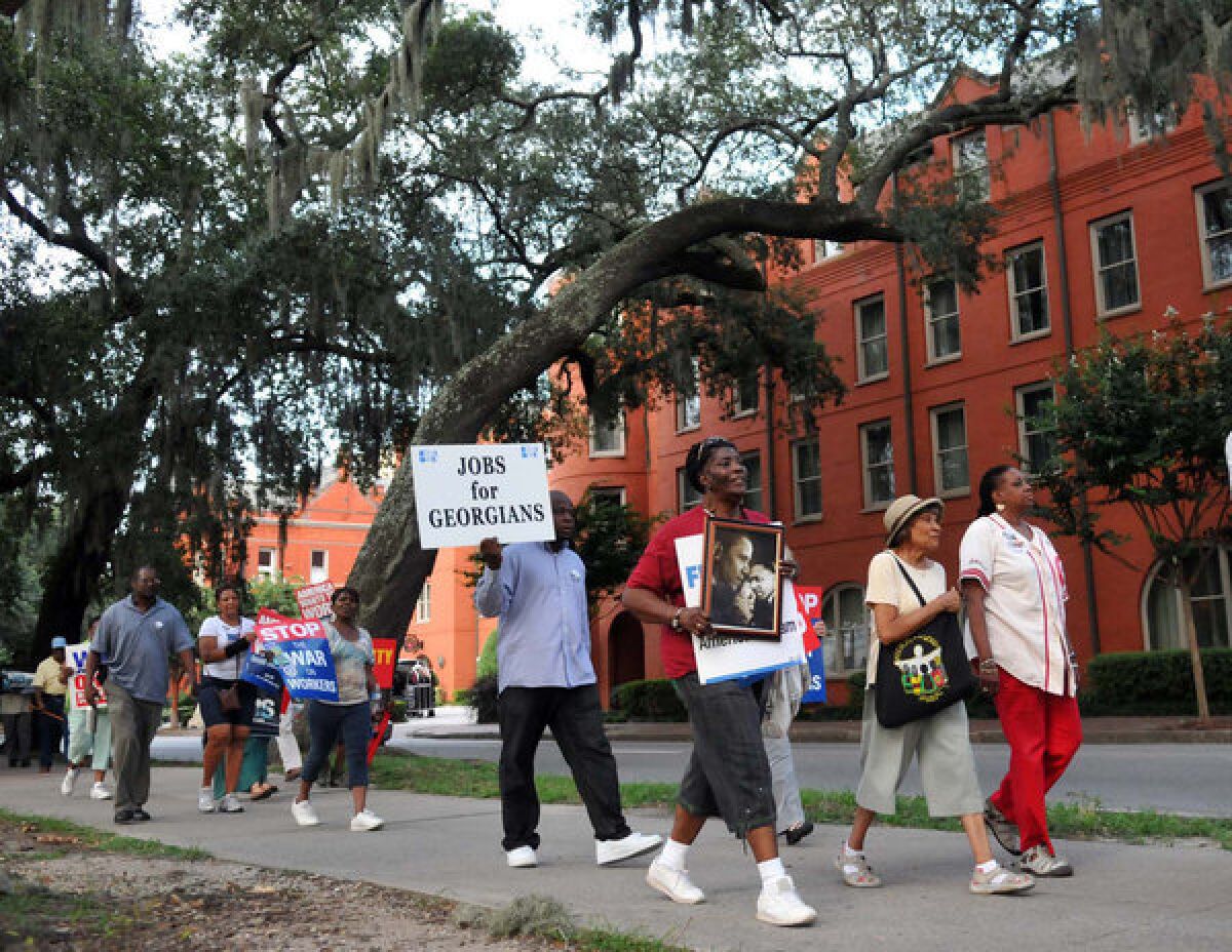Marchers make their way around Forsyth Park in Savannah Ga. to commemorate the August 28, 1963 March on Washington for Jobs and freedom led by the Rev. Martin Luther King, Jr. The march was sponsored by Savannah Regional Central Labor Council AFL-CIO, St. Phillip Monumental A.M.E. Church, and Interdenominational Ministerial Alliance.