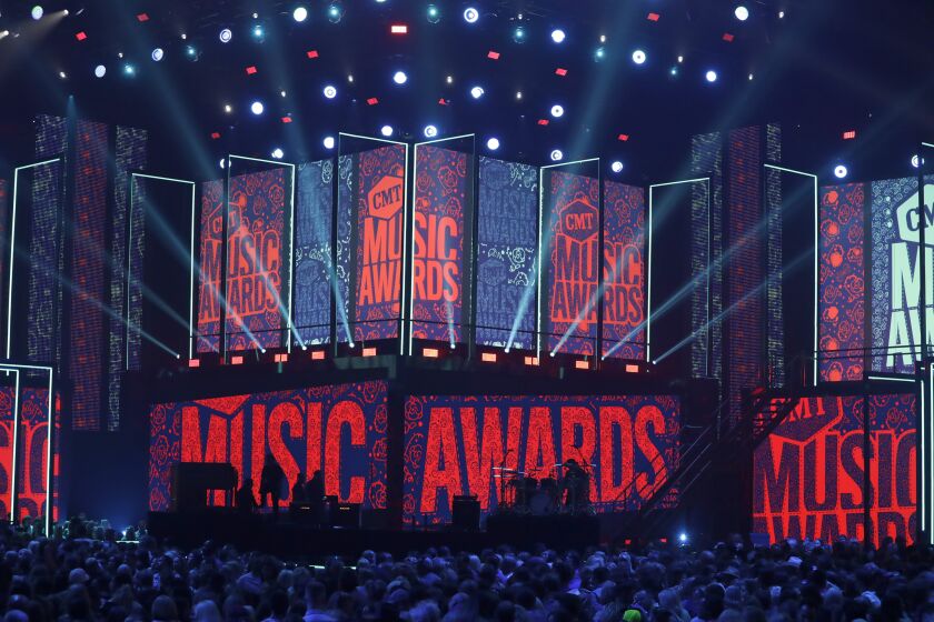 FILE - A general view of the stage is pictured at the CMT Music Awards on Wednesday, June 5, 2019, at the Bridgestone Arena in Nashville, Tenn. This year's CMT Music Awards will be a merging of country, rock and blues straight from the heart of Texas. The show will be hosted by Kane Brown and Kelsea Ballerini and fan-favorite Lainey Wilson is the leading nominee with four nominations. The CMT Music Awards airs live Sunday on CBS beginning at 8 p.m. Eastern. (AP Photo/Mark Humphrey, File)
