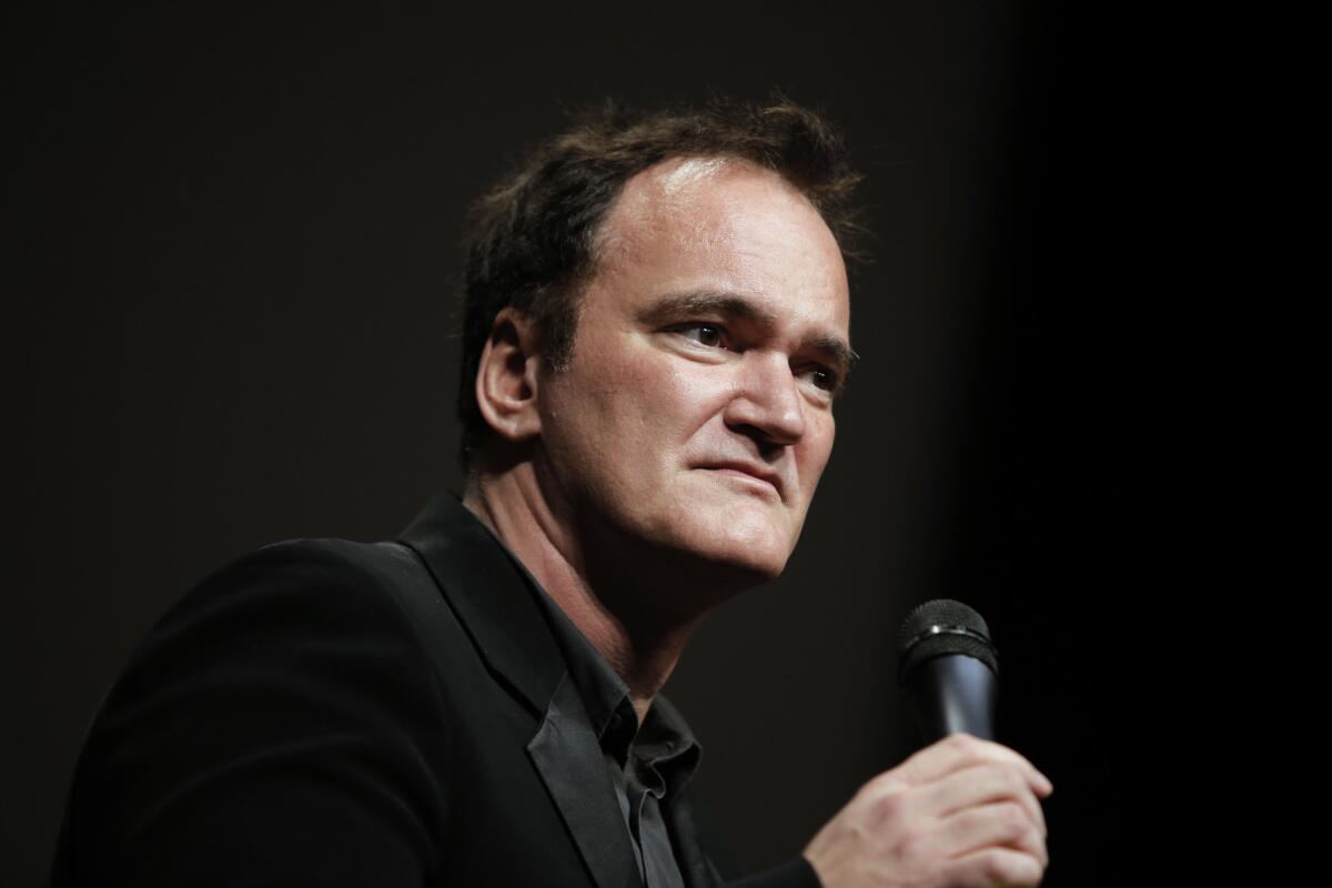 Director Quentin Tarantino delivers a speech before receiving the Lumiere Award during the Lumiere Festival in Lyon, France. Tarantino sued Gawker Media on Monday in Los Angeles for copyright infringement over the site's posting of a story that linked to a leaked copy of his script for a planned film called "The Hateful Eight."