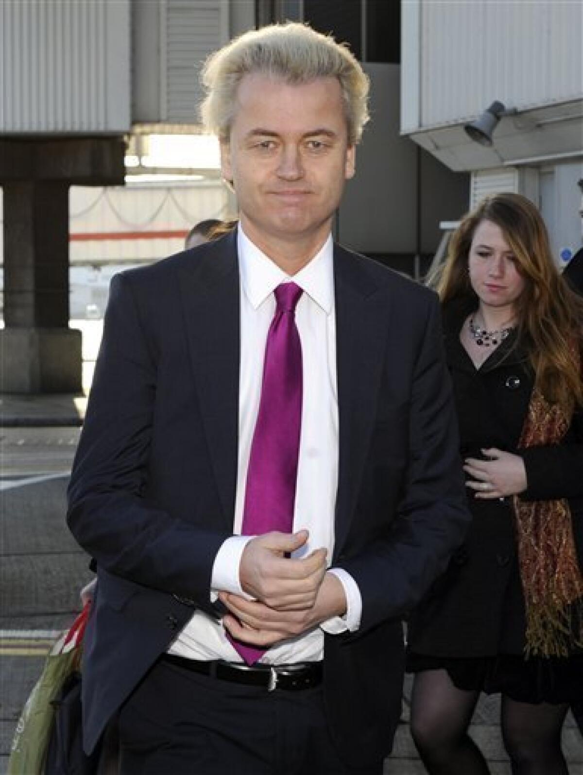 Dutch MP Geert Wilders and his entourage arrive at London's Heathrow Airport from Amsterdam, Friday March 5, 2010. (AP Photo)