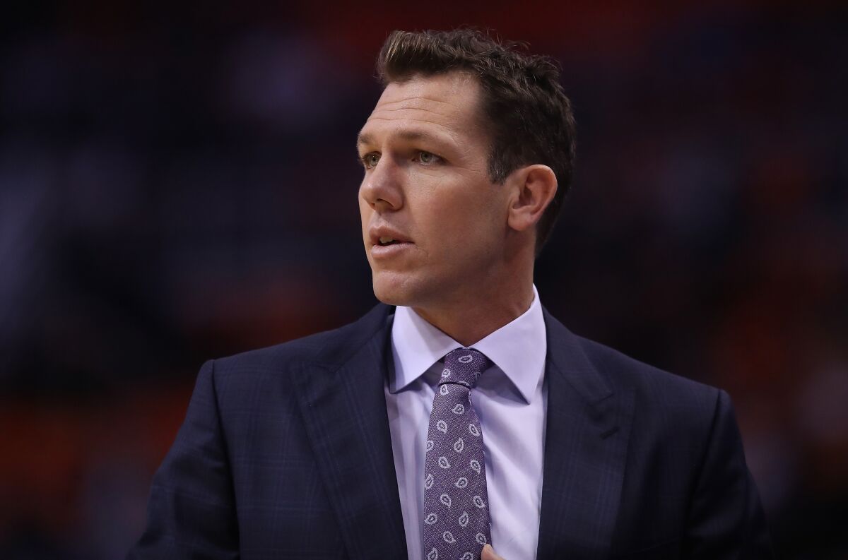 Luke Walton coaches the Sacramento Kings during a game against the Phoenix Suns on Oct. 23 at Talking Stick Resort Arena. 