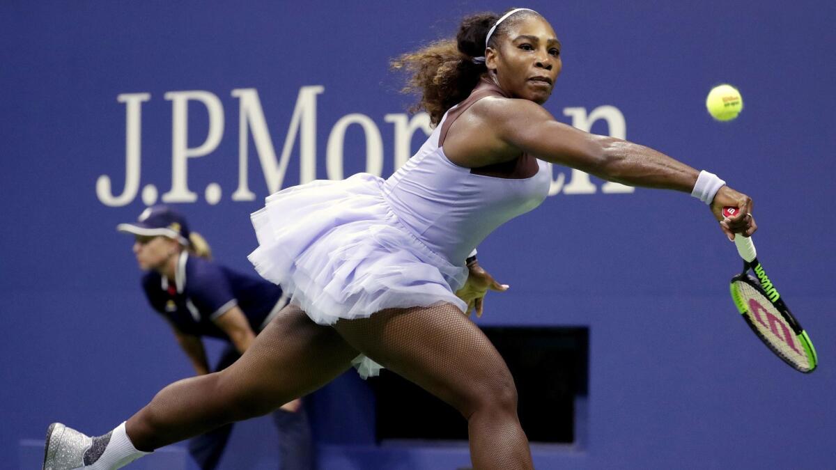 Serena Williams chases a shot by Carina Witthoeft, of Germany, during the second round of the U.S. Open.