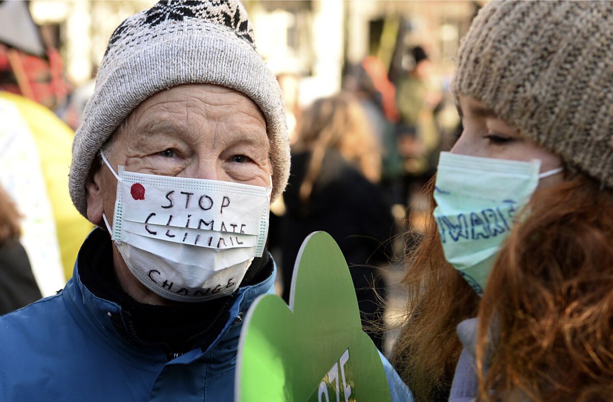 Activists participate in a demonstration against climate change in Katowice, Poland, on Dec. 8, 2018.