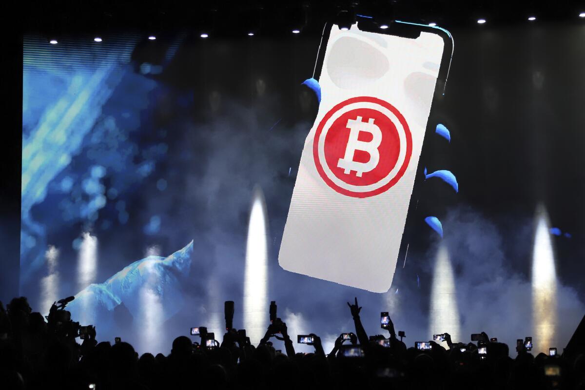 Bitcoin symbol on large screen