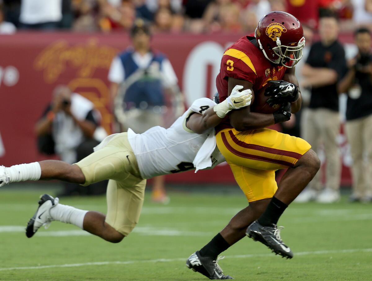 USC receiver Juju Smith-Schuster makes a catch in front of Idaho cornerback Jayshawn Jordan before breaking free on a 50-yard touchdown play in the first quarter of the season opener.