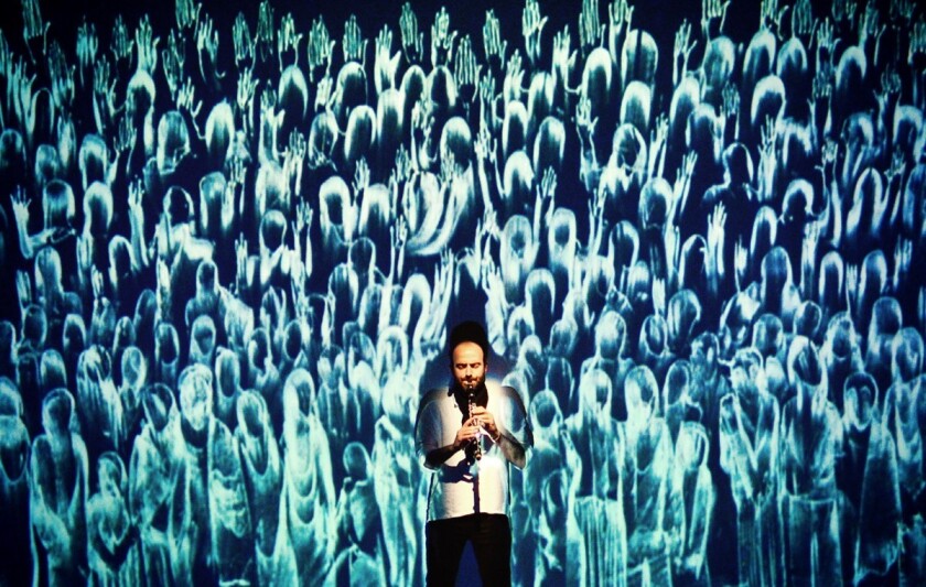 Silkroad Ensemble member Kinan Azmeh performs on the clarinet.