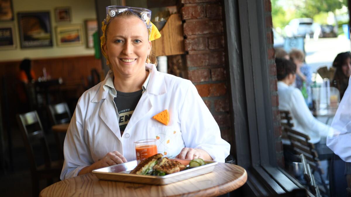 Owner Annie Miler sits at her restaurant Clementine Bakery in Los Angeles.