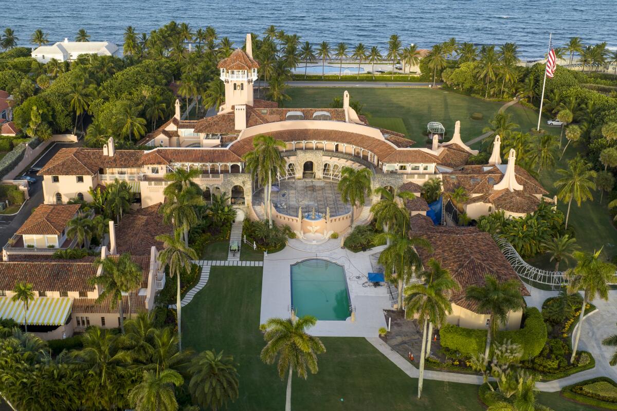 FILE - This is an aerial view of former President Donald Trump's Mar-a-Lago estate, Aug. 10, 2022, in Palm Beach, Fla. On Friday, Sept. 9, The Associated Press reported on stories circulating online incorrectly claiming a federal court order in the legal dispute over government documents held by Trump shows President Joe Biden ordered the FBI search at Trump’s Florida home. (AP Photo/Steve Helber, File)