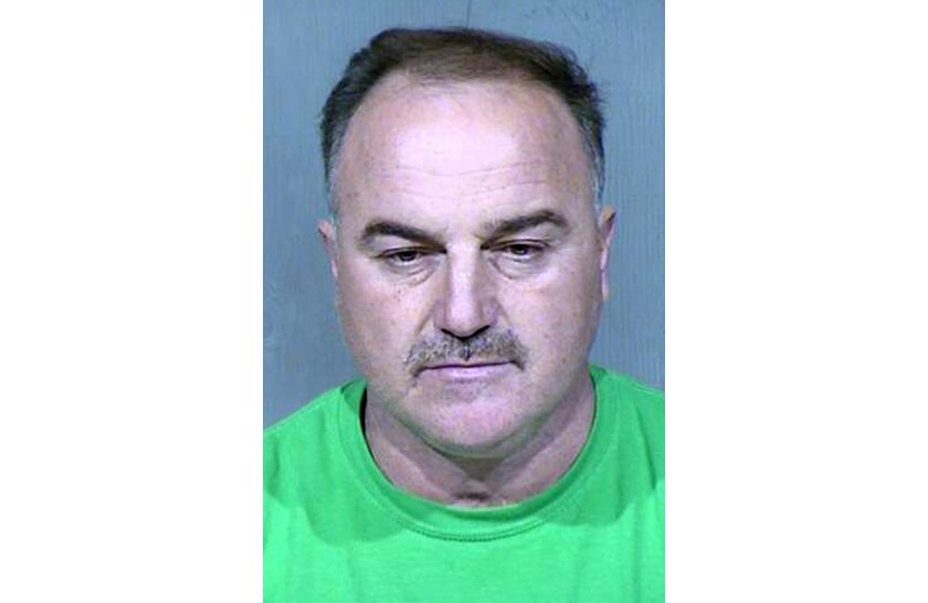 FILE - This undated booking photo provided by the Maricopa County Sheriff's Office shows Ali Yousif Ahmed Al-Nouri, who was arrested in January 2020 in Arizona as part of an extradition request made by the Iraqi government and has been accused of participating in the 2006 killing of two police officers in Iraq. A judge in Phoenix will hold a hearing on Thursday, July 15, 2021, over whether to sign off on a request to extradite Ahmed to Iraq. Ahmed has denied involvement in the killings. (Maricopa County Sheriff's Office via AP)