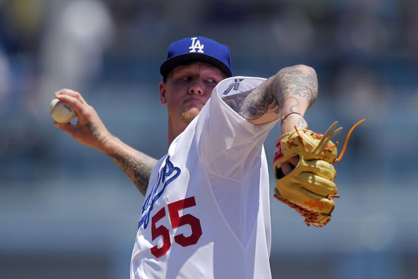 Mat Latos pitches for the Dodgers against the Angels on Aug. 2.