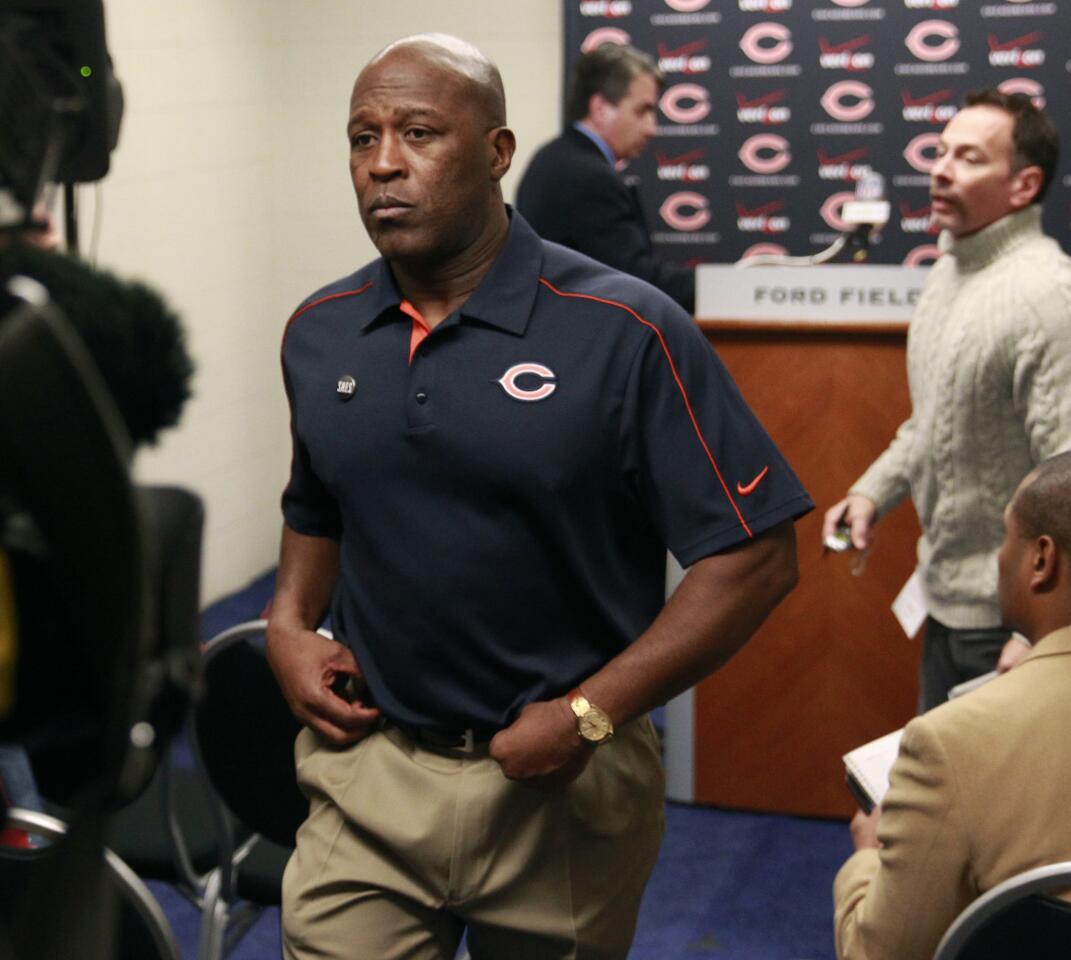 Lovie Smith walks away from the podium after his press conference at the end of his team's win over the Detroit Lions at Ford Field in the season finale on Dec. 30, 2012.