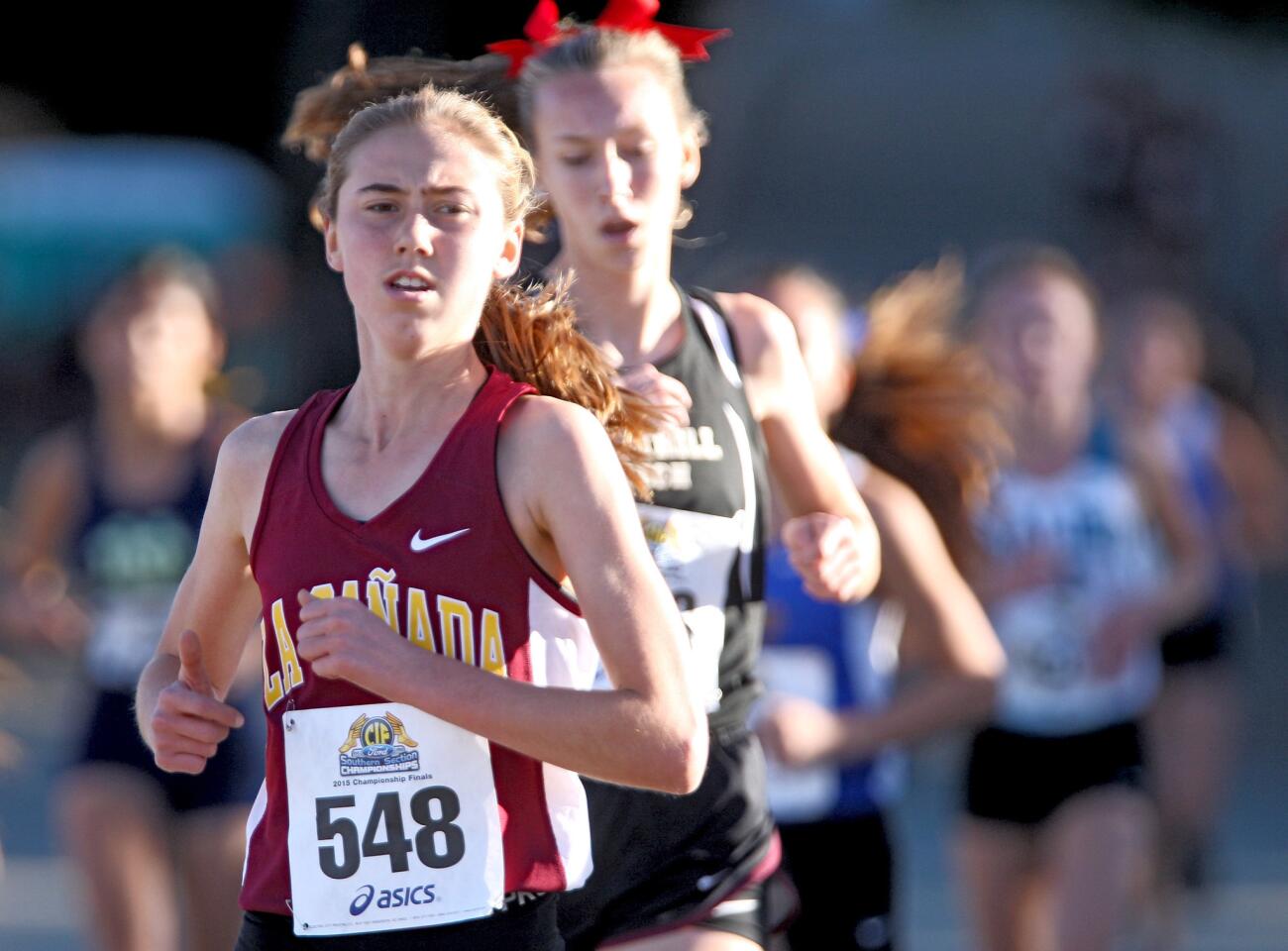 La Cañada High School's #548 Katie Scoville was able to pass all runners and win the CIF Southern Section girls division 4 cross country finals at Mt. San Antonio College in Walnut on Saturday; November 21, 2015.