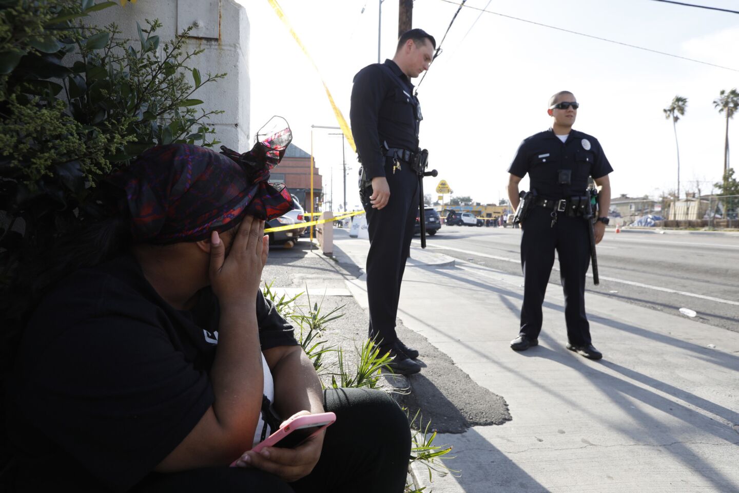 Takiya Taylor, 25, mourns the death of rapper Nipsey Hussle, who was killed in a shooting that wounded two other people outside Hussle's clothing store in South Los Angeles.