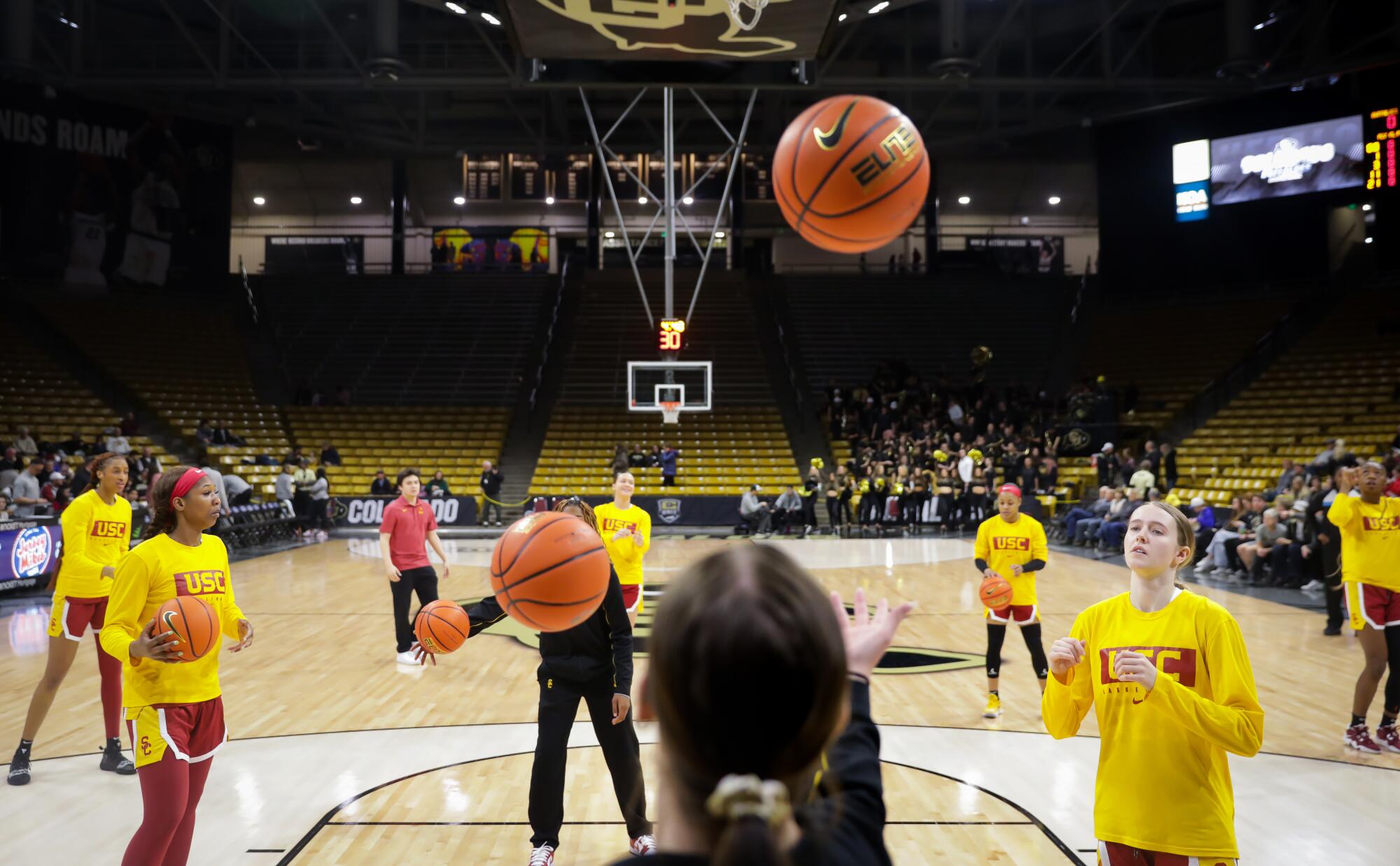 The USC women's basketball team warms up before their game against the Colorado Buffaloes.