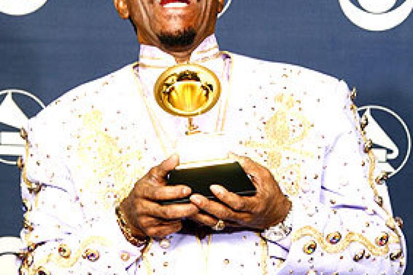 Ike Turner with his Grammy for Best Traditional Blues Album at the 49th Annual Grammy Awards in 2007.