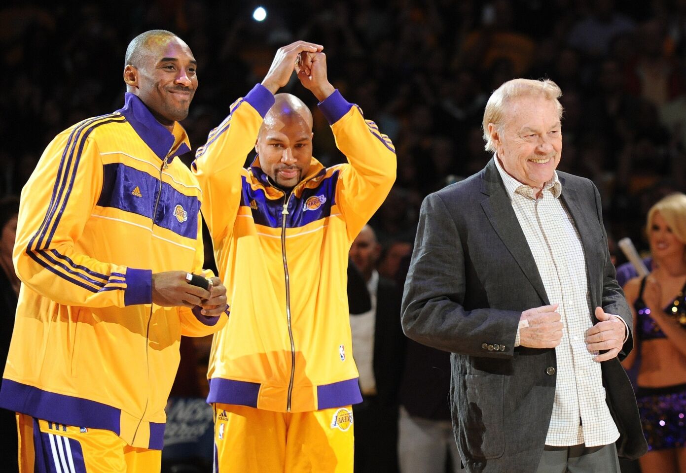 Jerry Buss takes center stage, along with Kobe Bryant and Derek Fisher, during the Lakers' ring ceremony after claiming their 16th NBA championship.