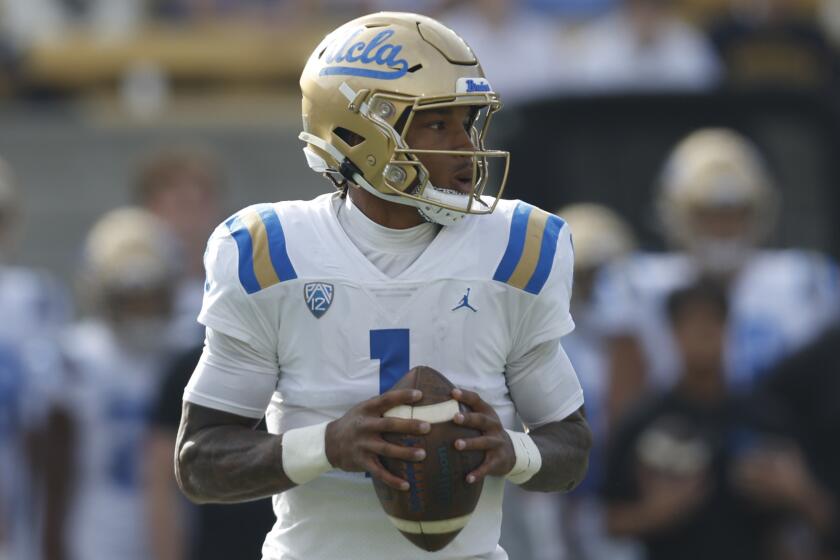 UCLA quarterback Dorian Thompson-Robinson (1) passes against California during an NCAA college football game.