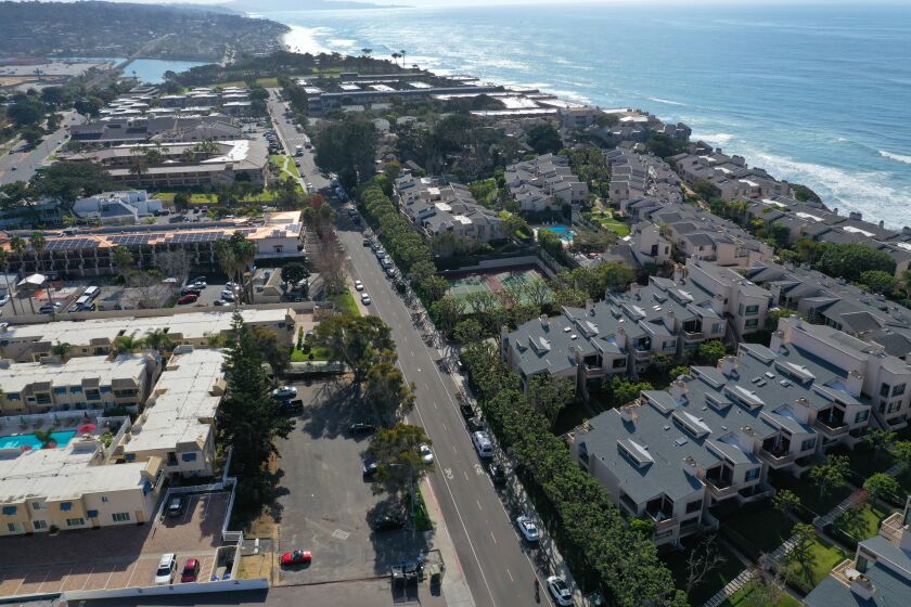 SOLANA BEACH, CALIF. -- TUESDAY, JANUARY 14, 2020: An aerial view of the site of a proposed affordable housing project near million-dollar condos on S. Sierra Ave, Solana Beach, a parking lot behind Sand Pebbles Resort in Solana Beach. It's a 10-unit project that has been in the works for the last 10 years and has yet to break ground in Solana Beach, Calif., on Jan. 14, 2020. (Allen J. Schaben / Los Angeles Times)