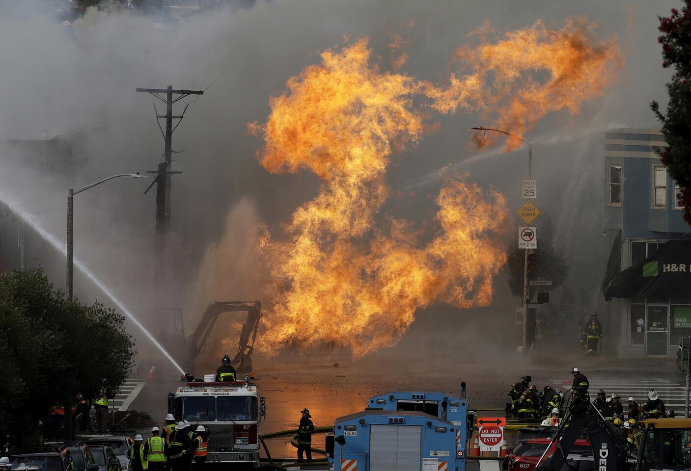 A gas explosion in San Francisco shot flames high into the air Wednesday and was burning four buildings as utility crews scrambled to shut off the flow of gas. Construction workers may have cut a natural gas line, Fire Chief Joanne Hayes-White said.