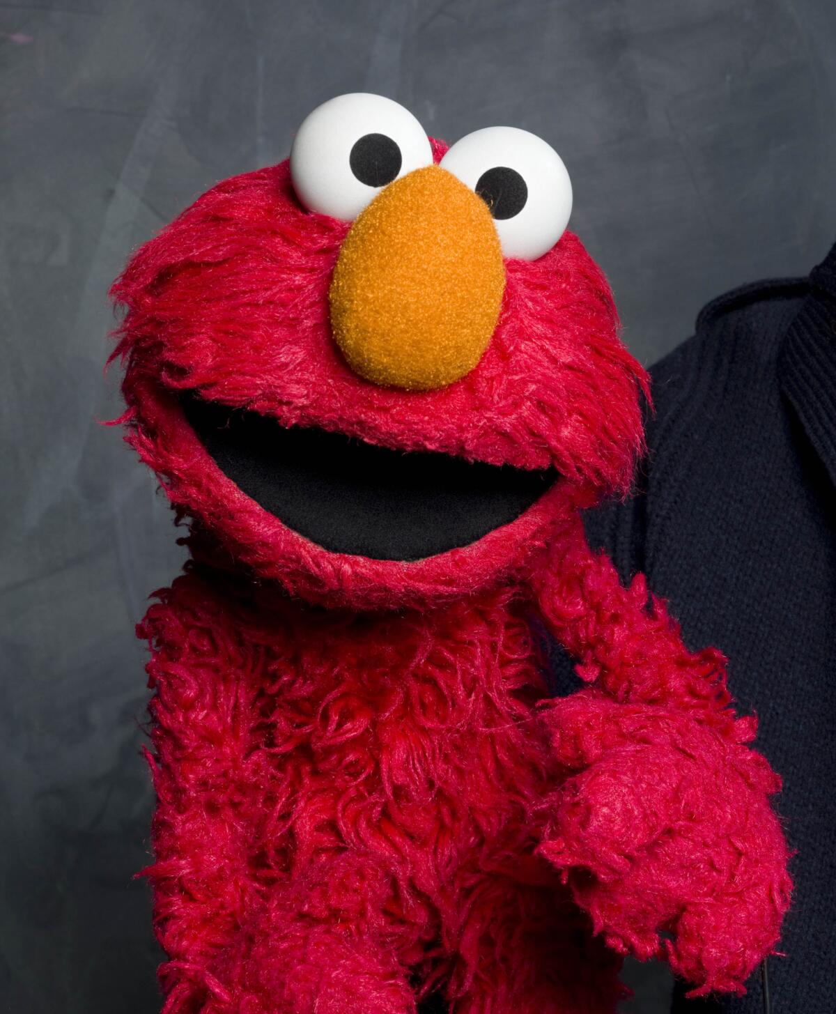 A close-up on Elmo, the red muppet with an orange nose who stars in "Sesame Street"