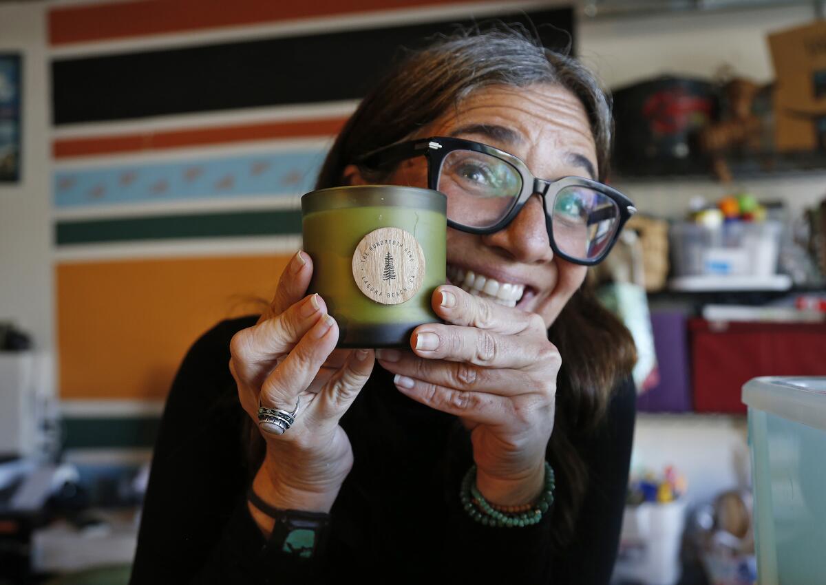 Kirsten "Kiki" Montgomery, owner of the Hundredth Acre candle company, in her Laguna Beach home studio. 