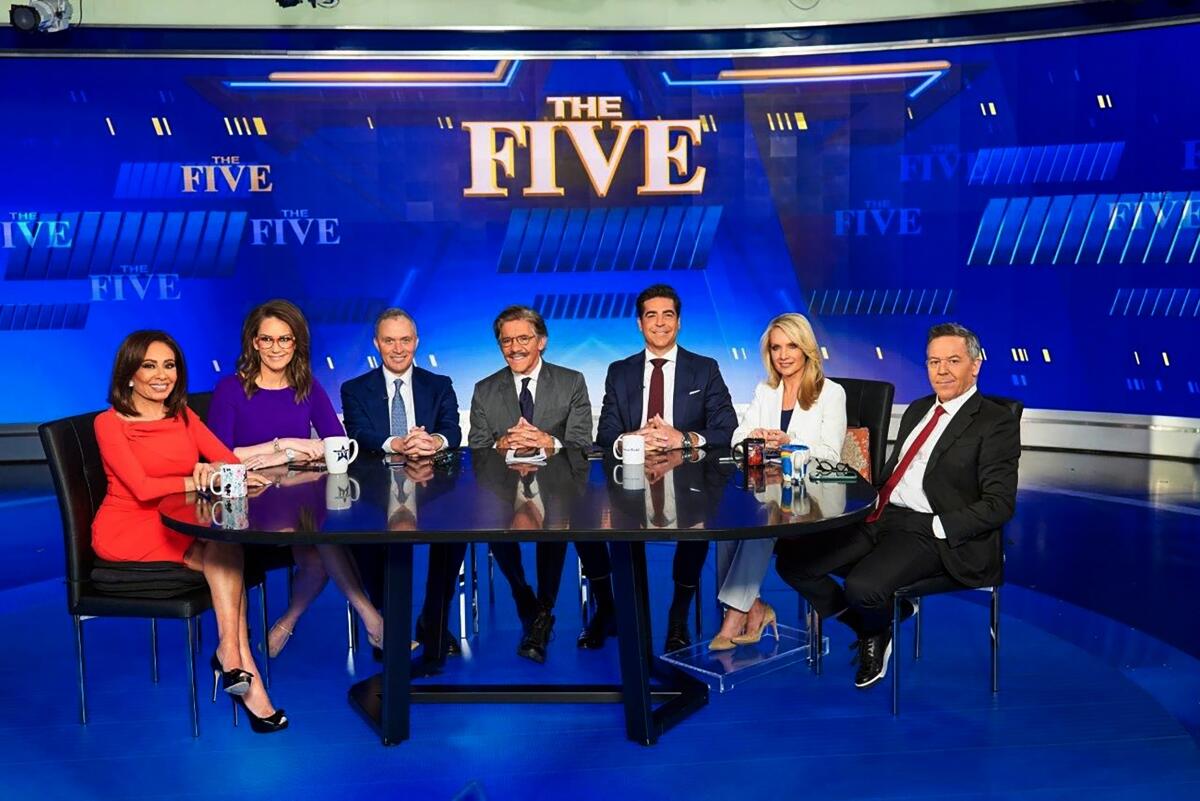 The hosts of "The Five" pose on set.