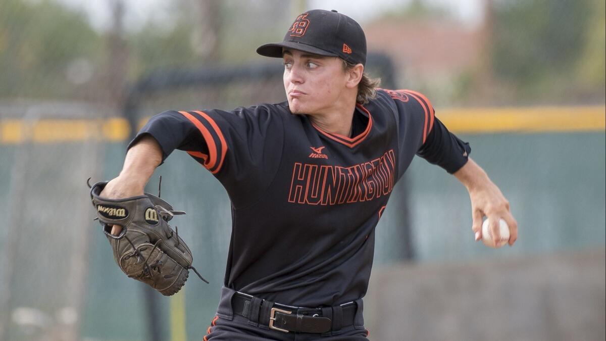 Nate Madole, shown pitching on March 9, 2018, threw 4 2/3 scoreless innings in Huntington Beach High's 6-0 win over Edison on Thursday.
