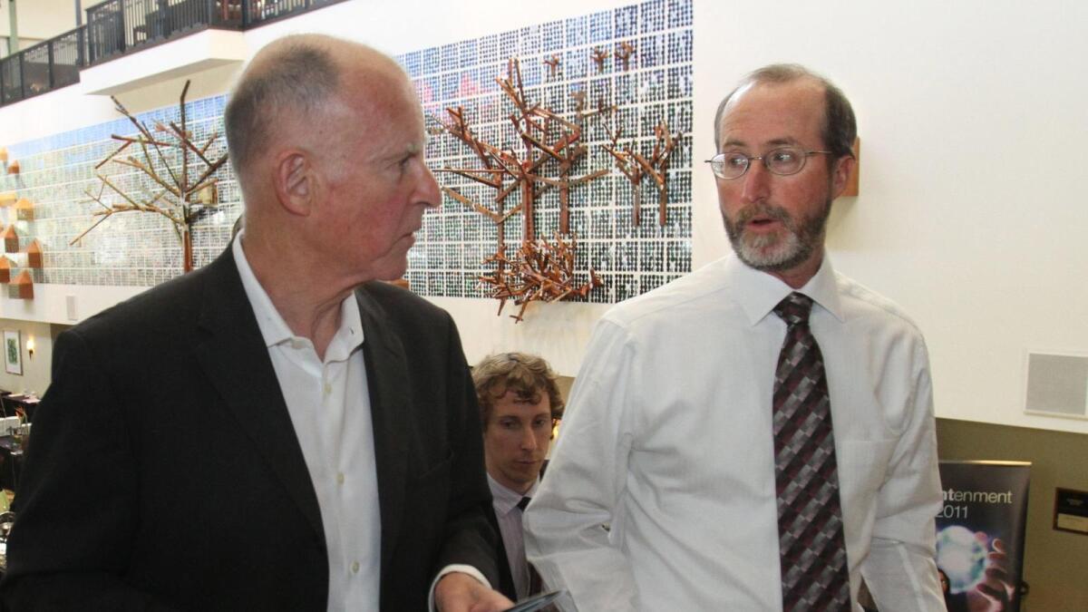 Gov. Jerry Brown speaks with Steve Glazer, then mayor of Orinda, in 2011.