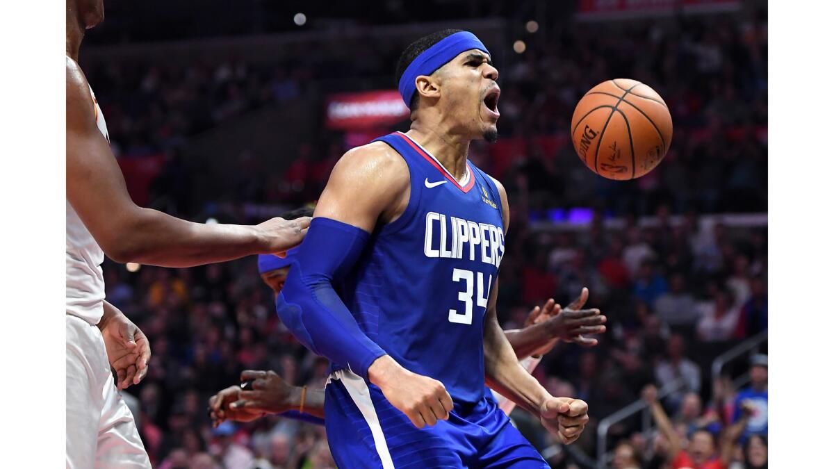 Clippers Tobias Harris celebrates his dunk against the Pacers.