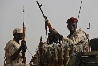 FILE - Sudanese soldiers from the Rapid Support Forces unit, led by Gen. Mohammed Hamdan Dagalo, the deputy head of the military council, secure the area where Dagalo attends a military-backed tribe's rally, in the East Nile province, Sudan, on June 22, 2019. An international rights group on Monday accused the paramilitary group in war-torn Sudan of sexual violence against women, including rape, gang rape, and forced and child marriage. A smaller number of incidents were also attributed to the military, it said. (AP Photo/Hussein Malla, File)