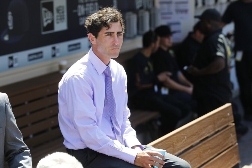 Padres General Manager A.J. Preller watches batting practice before the opening day game at Petco Park.