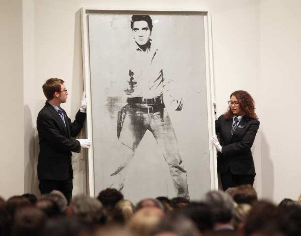 Andy Warhol's "Double Elvis" at Sotheby's auction in New York.