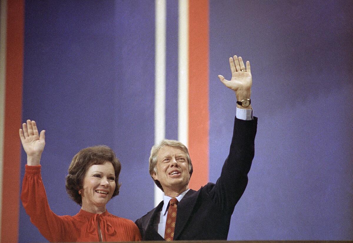 FILE - In this July 15, 1976 file photo Jimmy Carter with Wife Rosalynn Carter