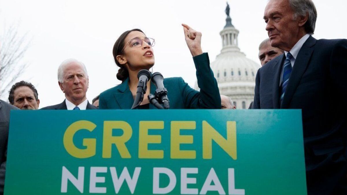 Rep. Alexandria Ocasio-Cortez (D-N.Y.) speaks about the proposed "Green New Deal" with other congressional supporters of the plan in Washington on Feb. 7.