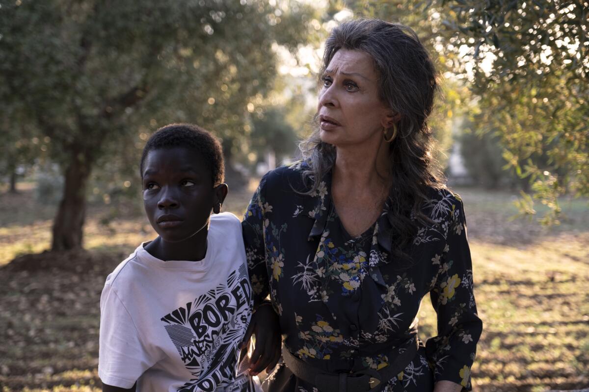 Ibrahima Gueye and Sophia Loren in the movie "The Life Ahead."