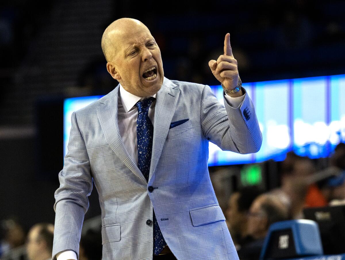 UCLA coach Mick Cronin shouts on the sideline during a game against Oregon State at Pauley Pavilion.