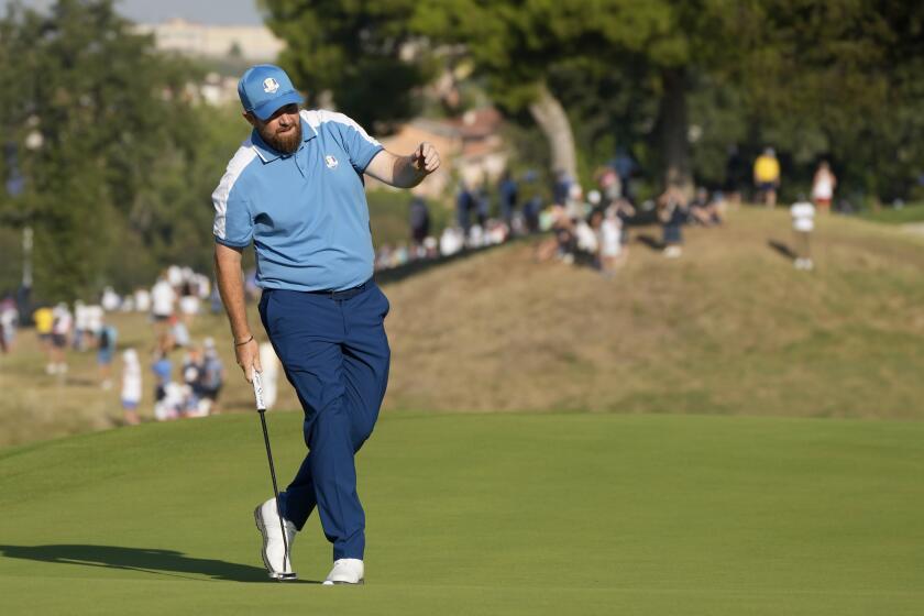 Europe's Shane Lowry reacts on the 6th green during his morning Foursome match at the Ryder Cup golf tournament at the Marco Simone Golf Club in Guidonia Montecelio, Italy, Friday, Sept. 29, 2023. (AP Photo/Alessandra Tarantino)