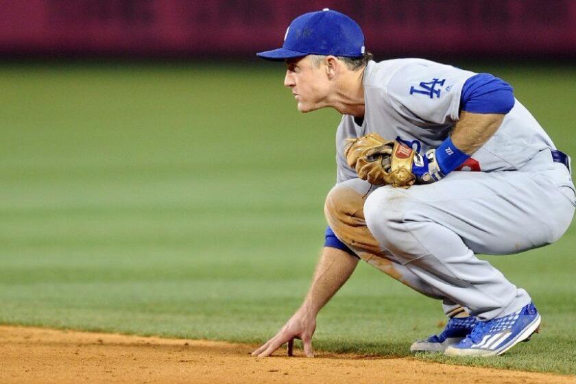 Dodgers second baseman Chase Utley keeps an eye on a baserunner at Angel Stadium during a game on May 16.