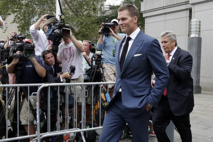 New England Patriots quarterback Tom Brady leaves federal court in New York on Wednesday