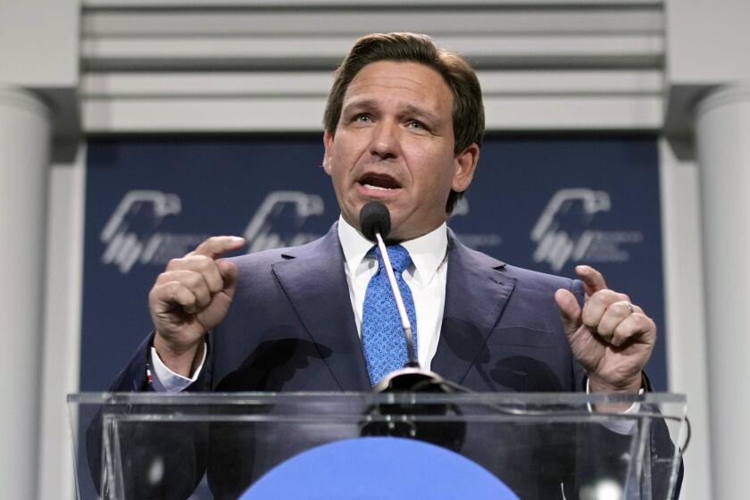 FILE - Florida Gov. Ron DeSantis speaks at an annual leadership meeting of the Republican Jewish Coalition on Nov. 19, 2022, in Las Vegas. DeSantis reiterated Monday, Jan. 23, 2023, that the state's rejection of a proposed nationwide advanced African American studies course, saying it pushes a political agenda — something three authors cited in the state's criticism accused him of doing in return. (AP Photo/John Locher, File)