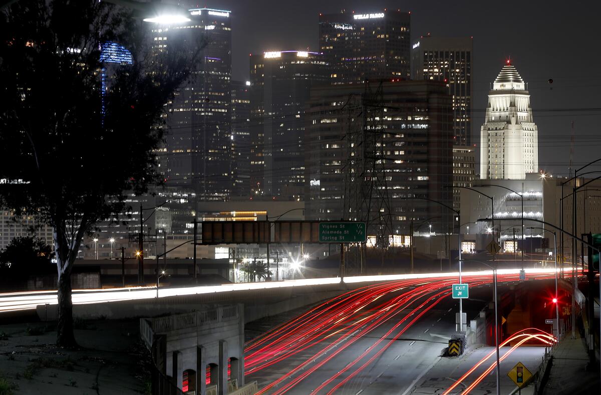 Traffic is light April 1 on the interchange of the 101 and 10 freeways in downtown Los Angeles California remains in coronavirus lockdown.