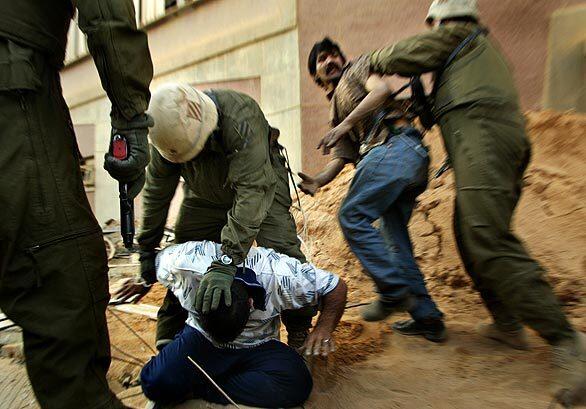 Confronting looters in Baghdad