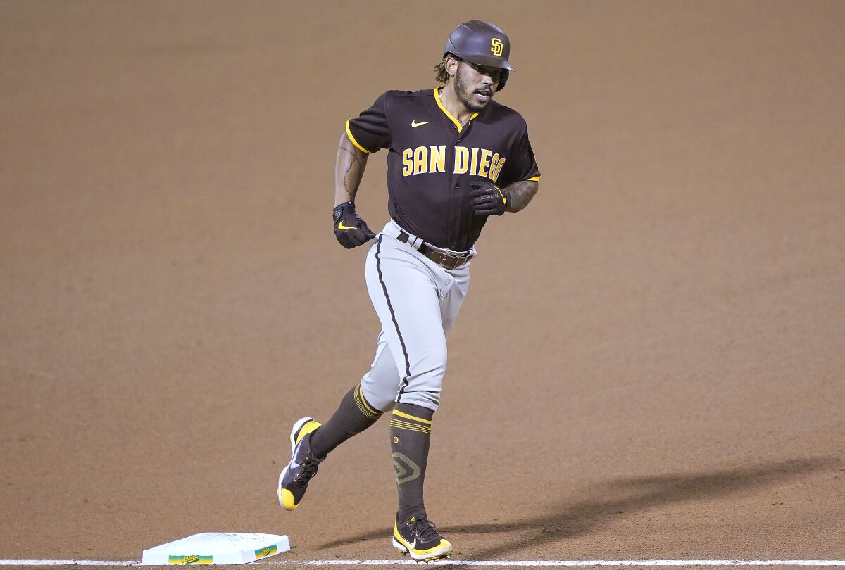 Padres' Luis Campusano rounds the bases after hitting a solo home run in Oakland on Sept. 4.