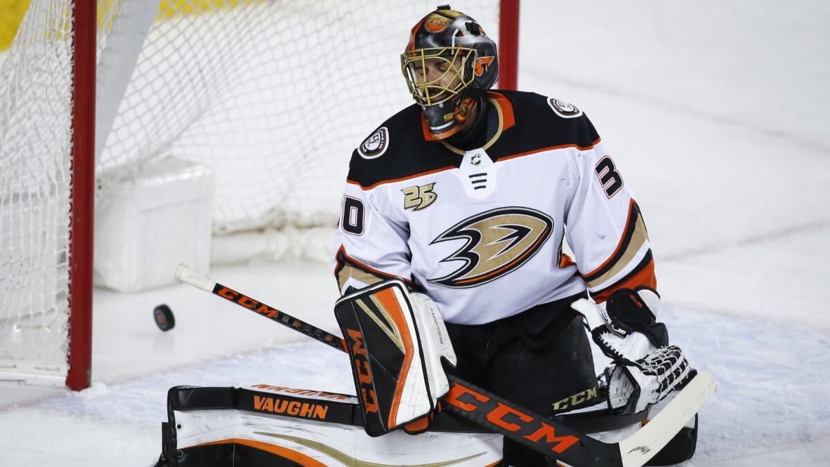 Ducks goaltender Ryan Miller reacts after giving up a goal during a 6-1 loss to the Calgary Flames on Friday.