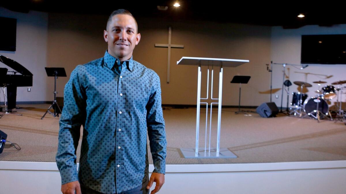 City Light Baptist Church lead pastor Nick Reed in the church's main sanctuary Tuesday. The church has about 300 members and has moved into its new location with a 20-year lease.