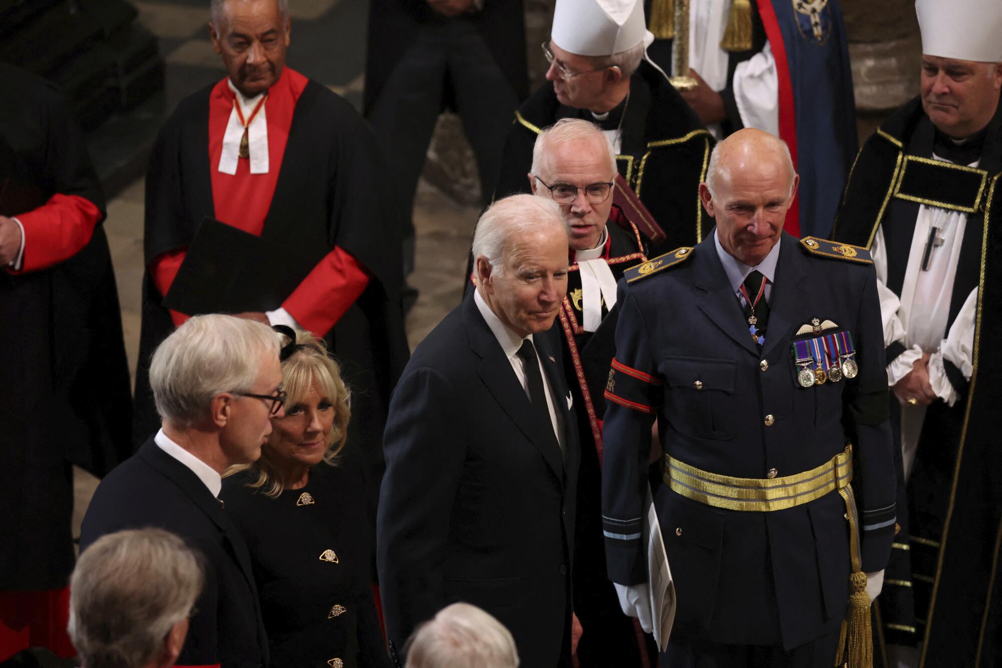 President Joe Biden and First Lady Jill Biden arrive at Westminster Abbey for Queen Elizabeth II's funeral.