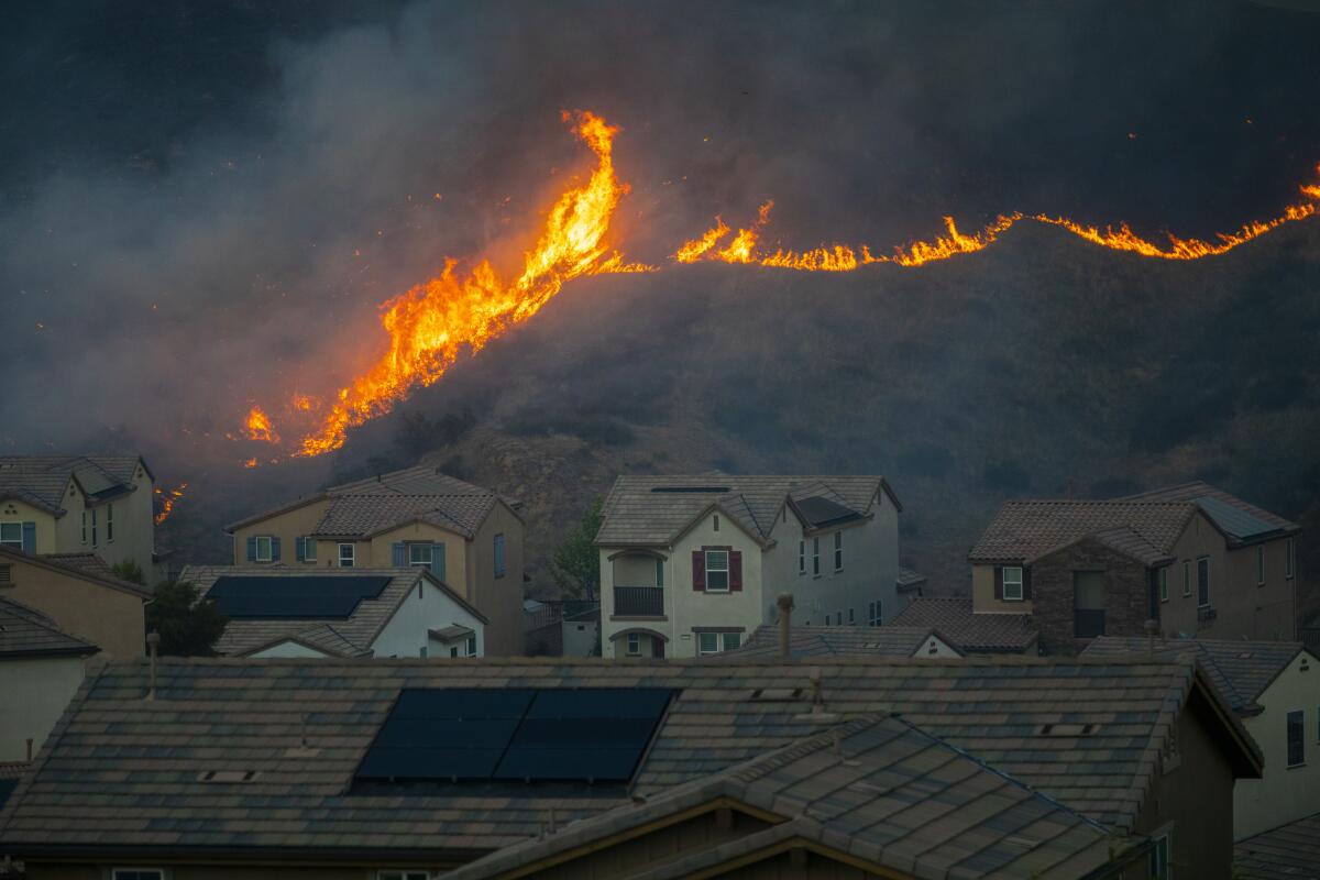A fire in the Castaic and Valencia area quickly spread to at least 650 acres, triggering mandatory evacuation orders