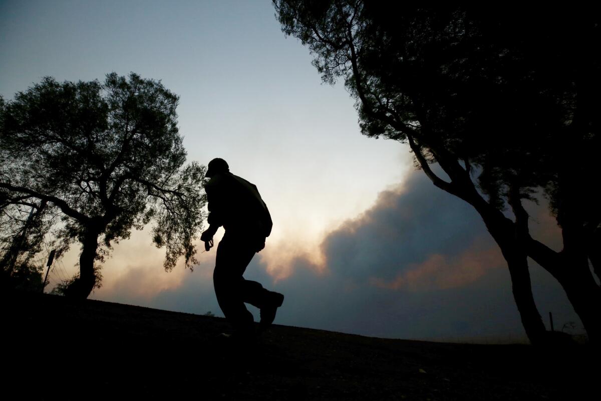 Brent Lamb is set to help move horses at a ranch near Simi Valley amid the Easy fire