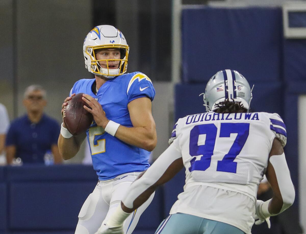 Chargers quarterback Easton Stick looks to pass during the first quarter.